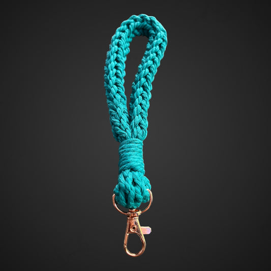 Crocheted wristlet keychain in teal with a rose gold lobster clasp.