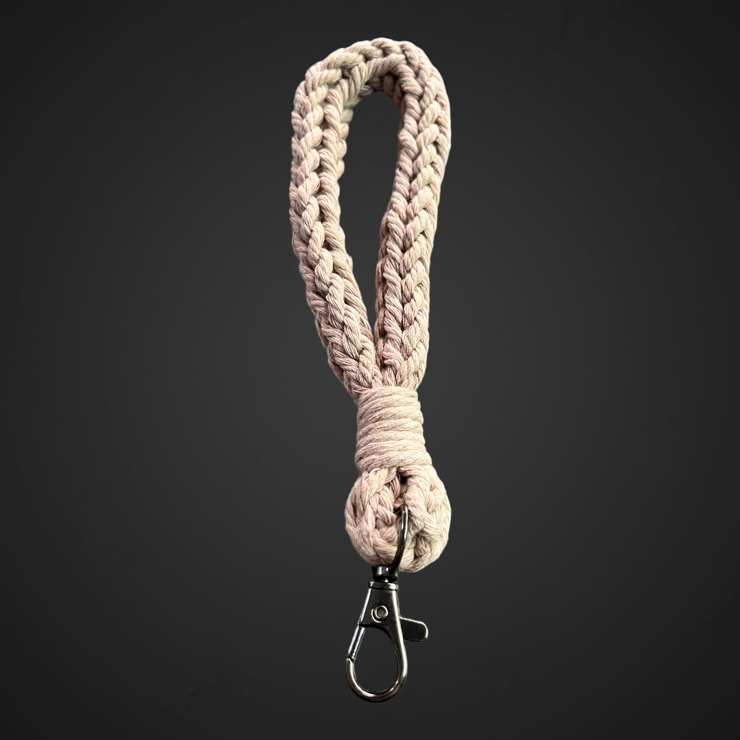 Crocheted wristlet keychain in dusty rose with a gunmetal lobster clasp.